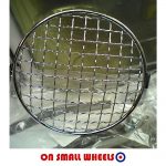 Vespa headlamp grill